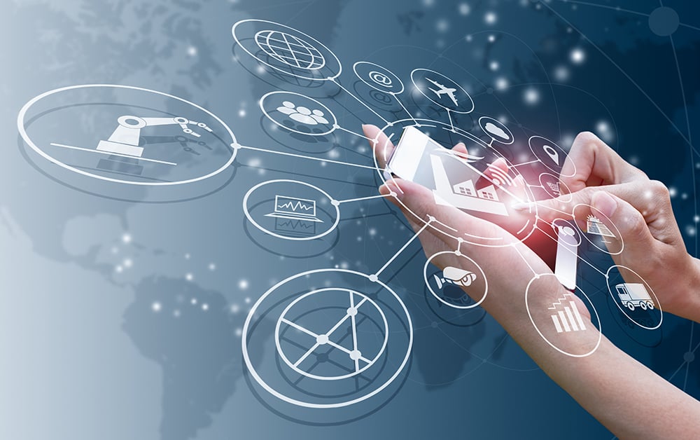 shutterstock_725962114-4.0industrial-icons-in-web-over-hands-on-iphone-1000x628